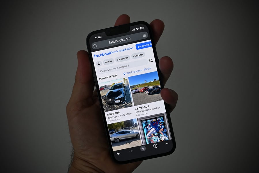 A person scrolling a personalized phone feed, the endpoint of millions of AI ad targeting calculations per second