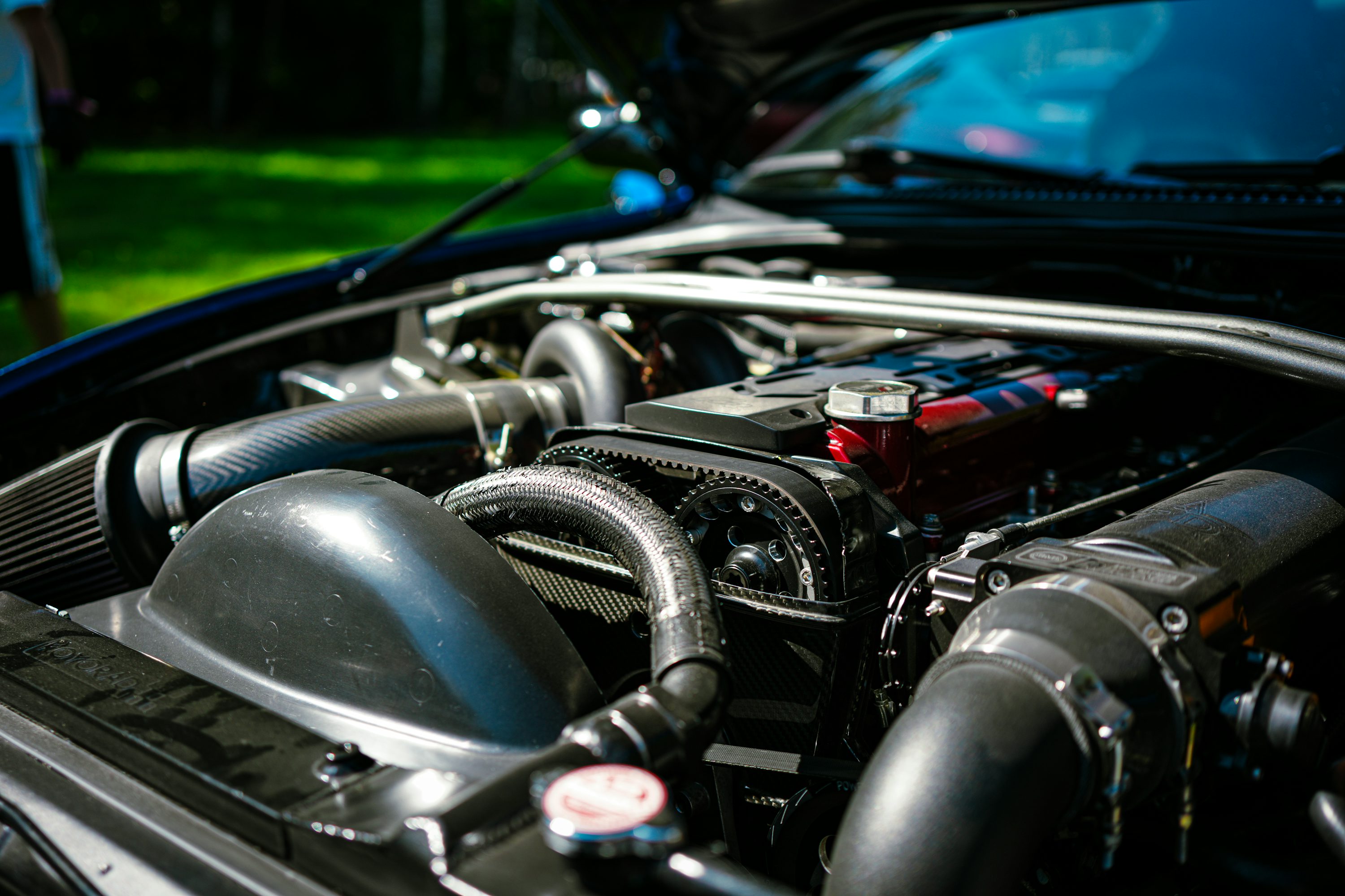 Car engine bay close-up during a professional auto repair service