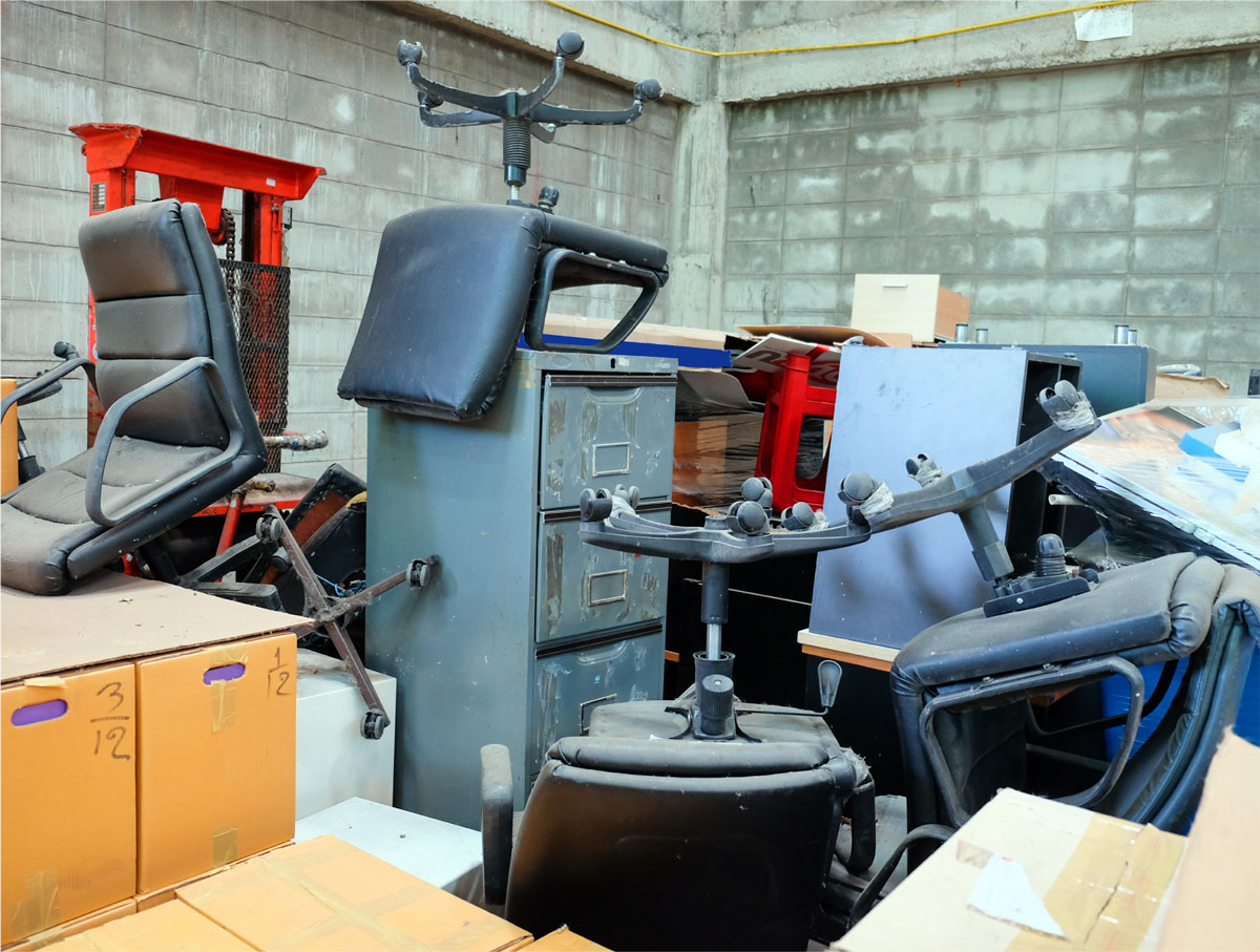 Office furniture being removed by Prime Junk Removal Dubai
