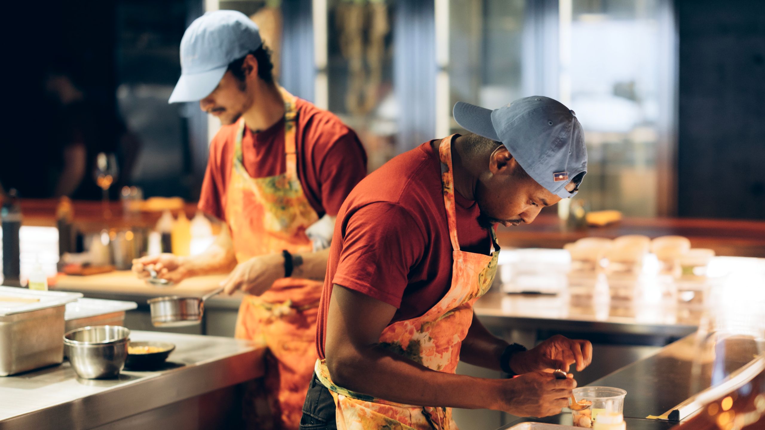 A kitchen team working together during service