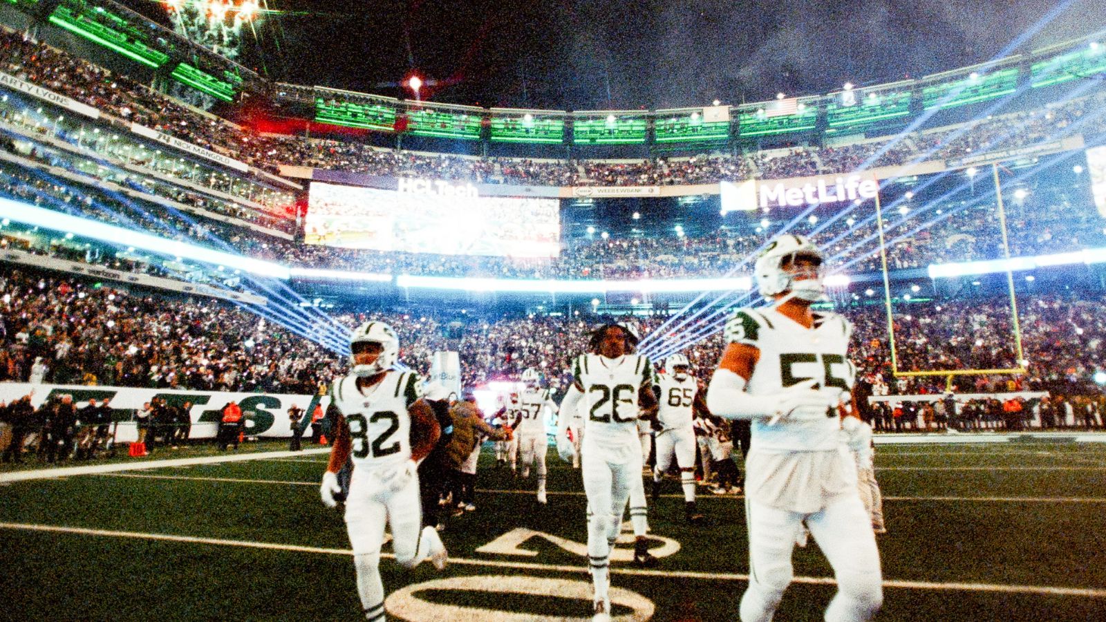 Players running onto the field amid lasers and a roaring crowd, the energy every big game ad competes against