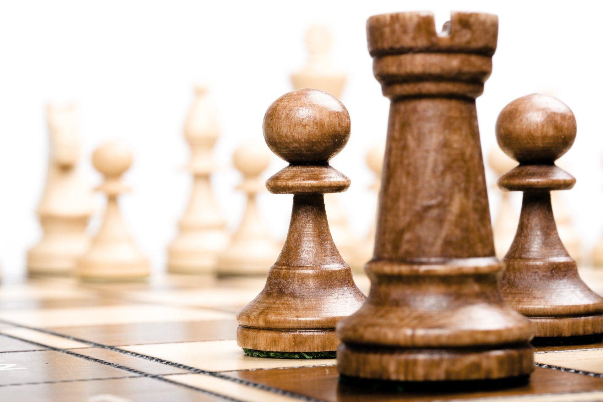 A chess board mid-game, the strategy frame for choosing moves instead of chasing tools