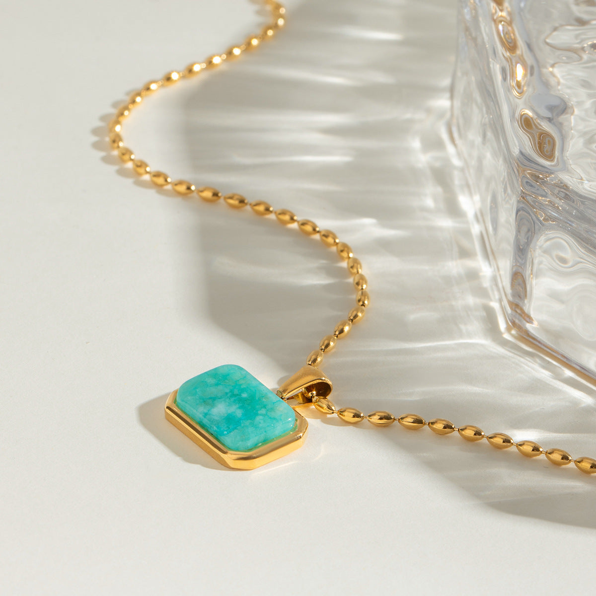 Lune gold chain necklace with turquoise rectangular pendant