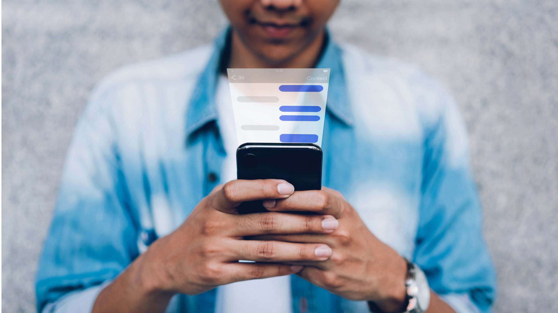 Hands holding a phone with an AI chat open, testing ChatGPT for investing questions