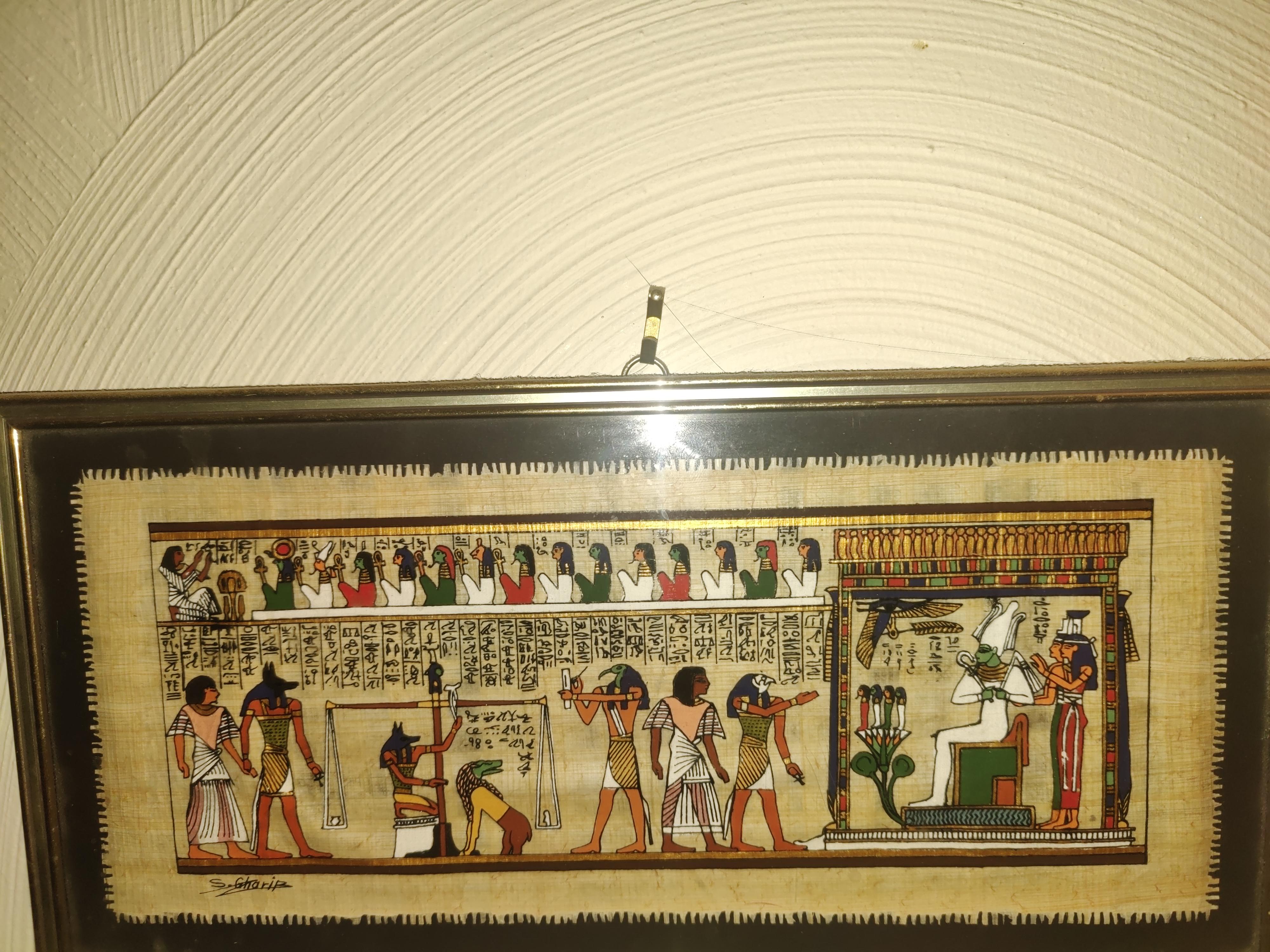 Modern papyrus painting of the weighing-of-the-heart scene.