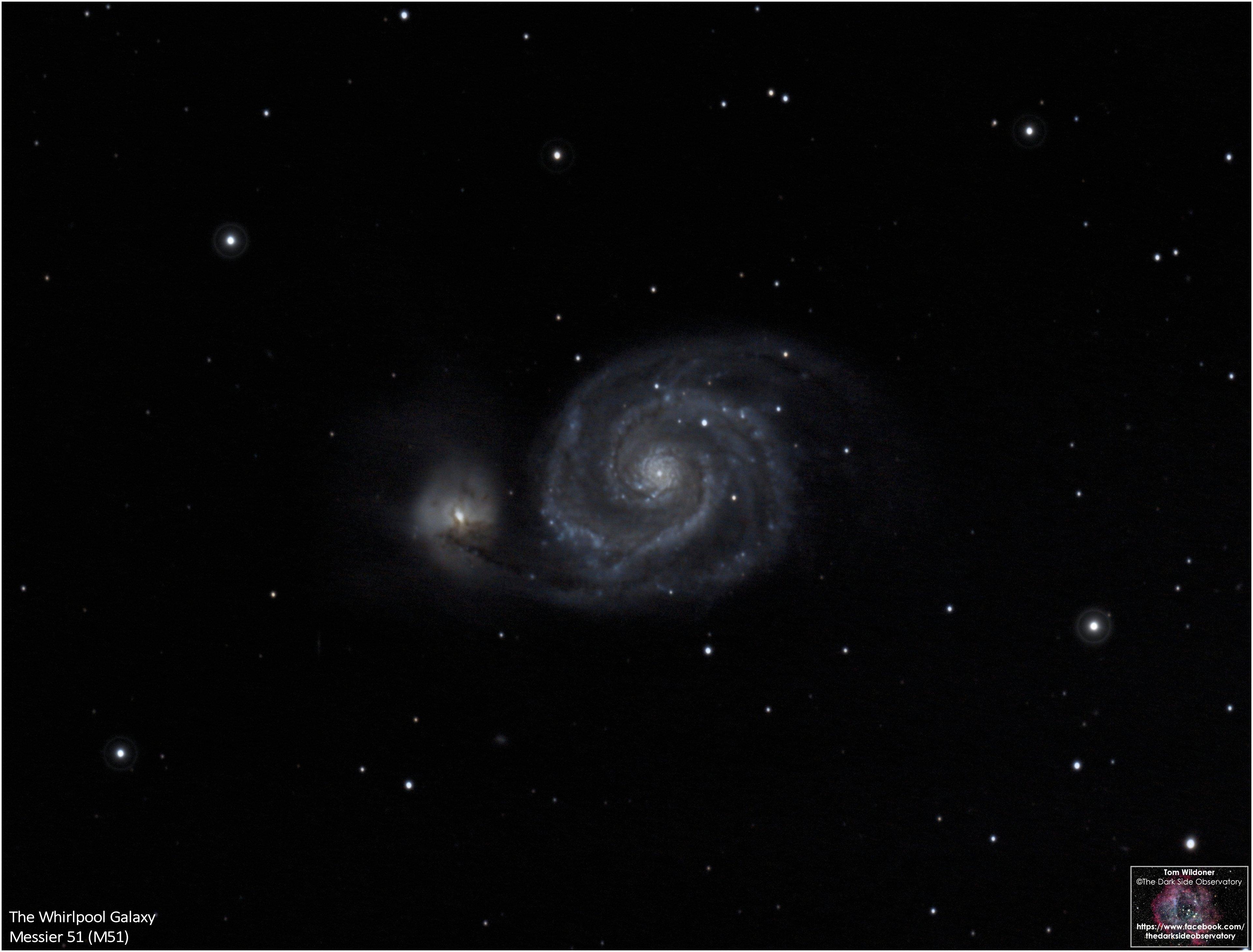 The Whirlpool Galaxy (Messier 51) photographed through a telescope.