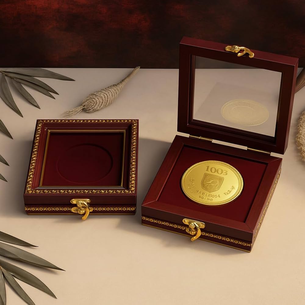 Gold coin in a gift box