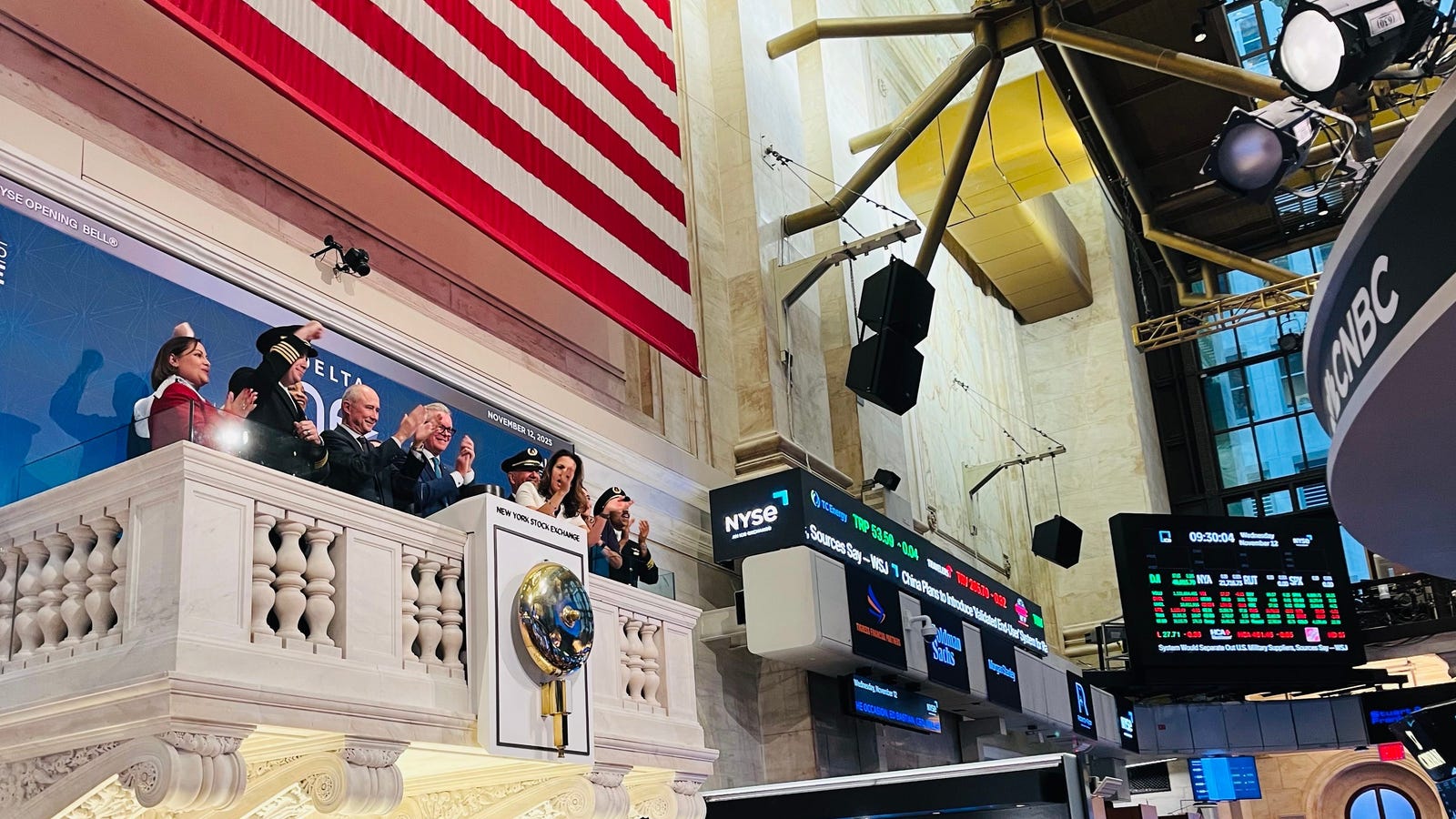 The Wall Street sign near the New York Stock Exchange, where quant hedge funds quietly test AI stock prediction models