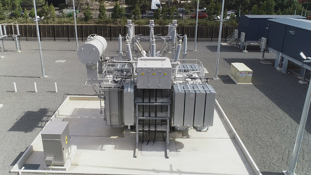 Three phase power transformer bank at electrical facility