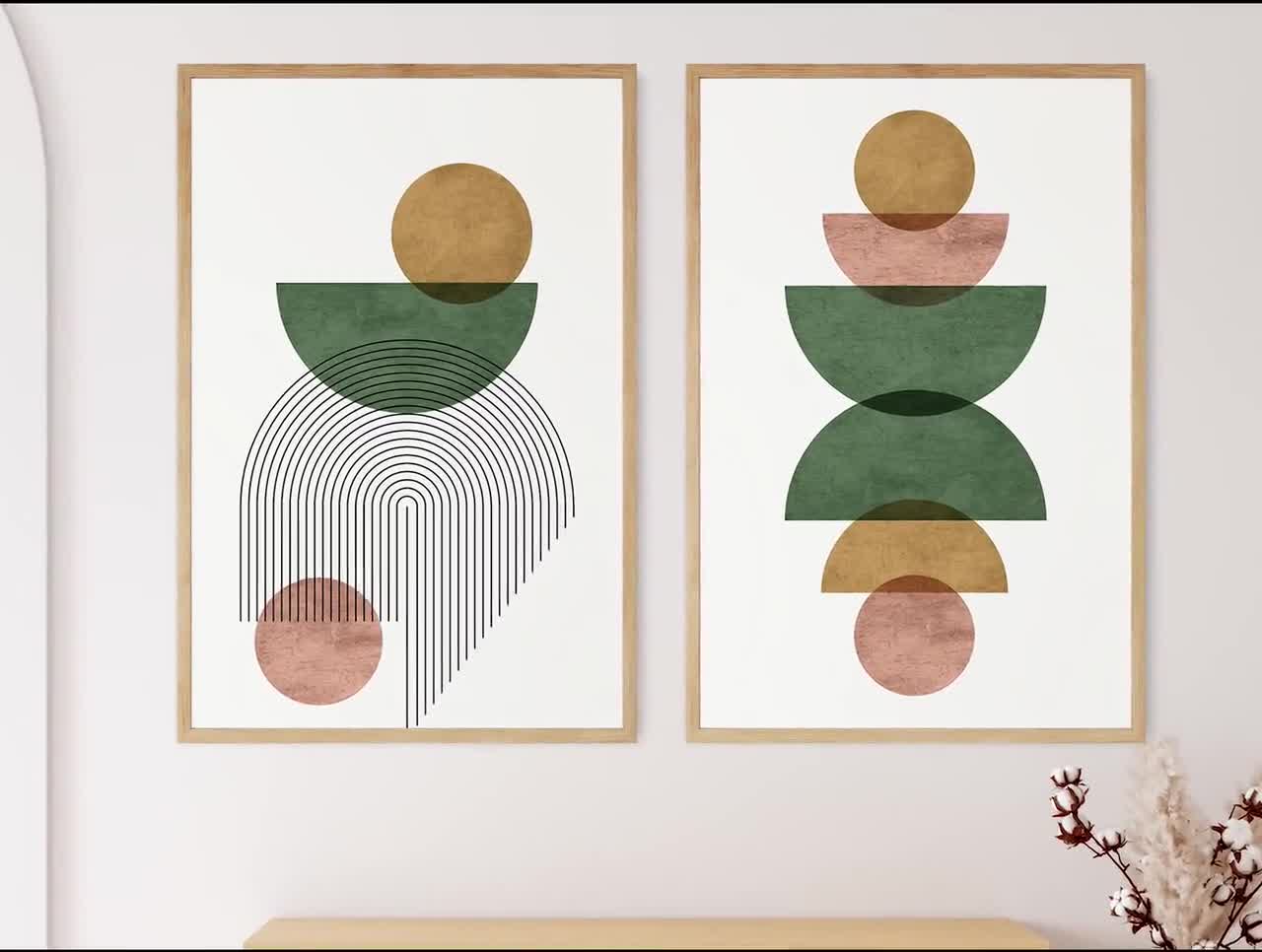 Framed abstract geometric prints combining thin ruled arcs, circles and semicircles