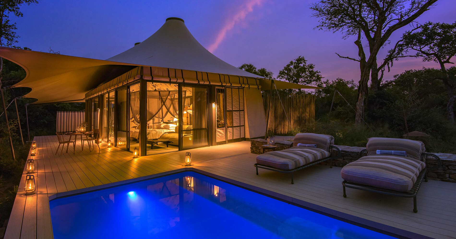 A luxury safari lodge overlooking the Masai Mara at dusk