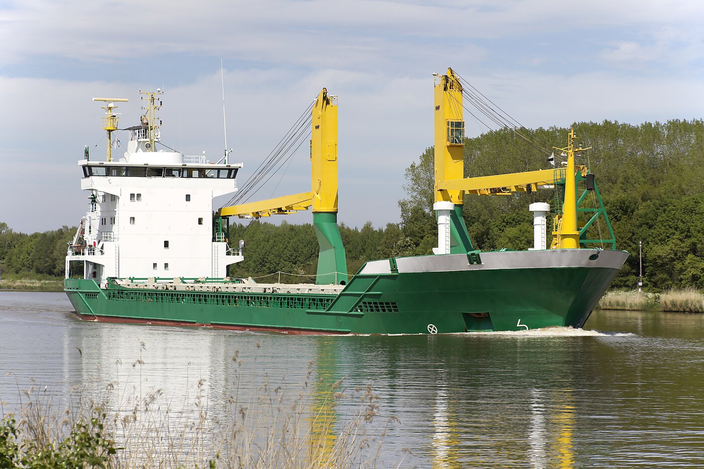 Container ship sailing at sea representing the latest trends in maritime law