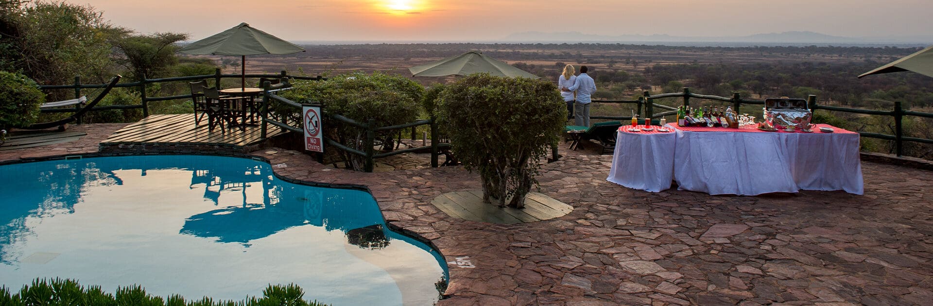 Campfire and lounge at a private tented camp