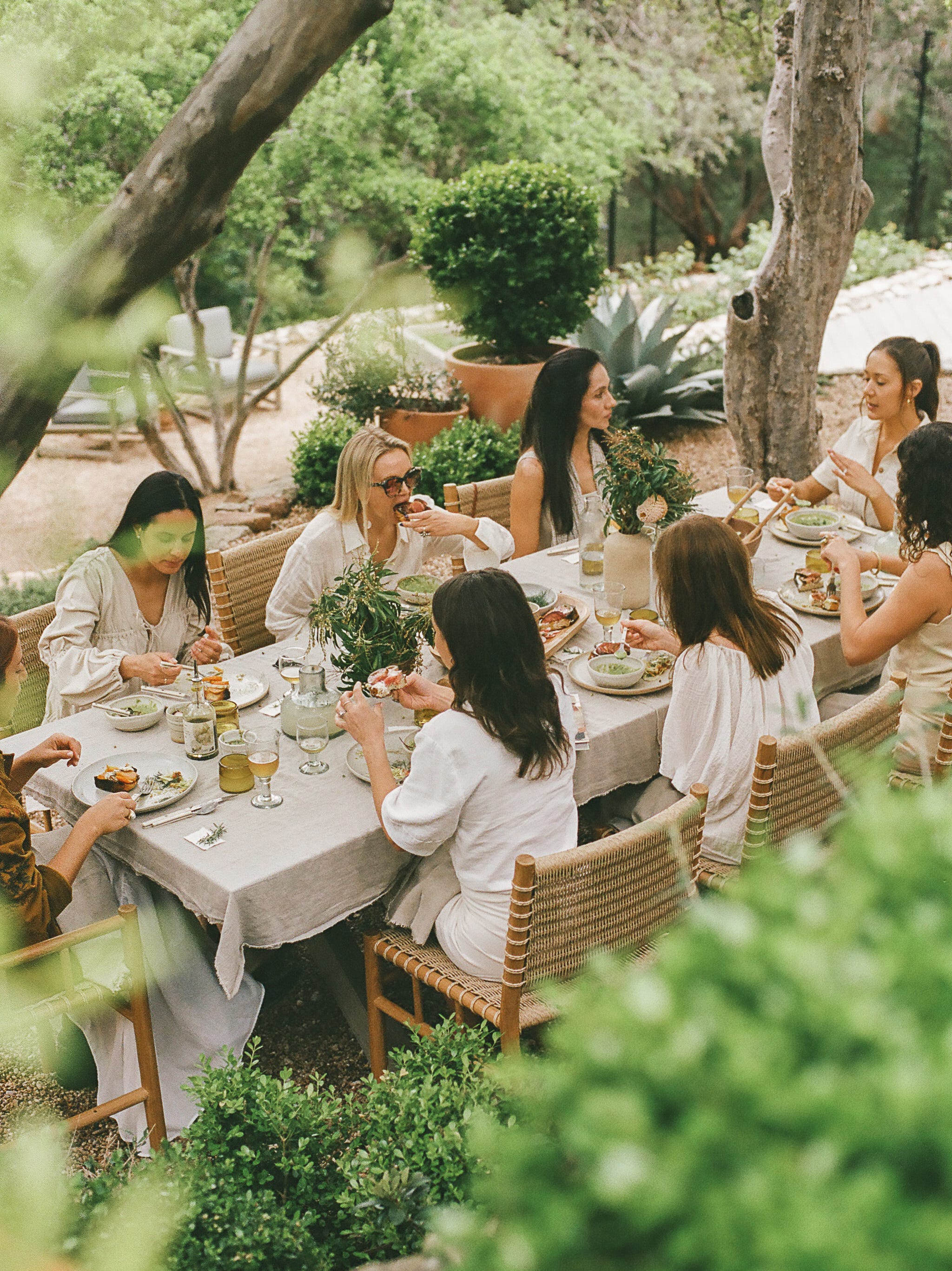 Guests enjoying a meal together at a restaurant table